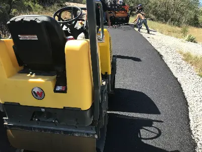 PMG Paving & Maintenance Team working on an asphalt installation