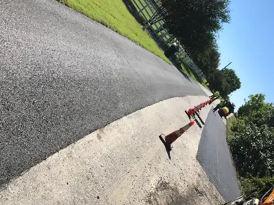 PMG Paving & Maintenance Contractors working on an asphalt paving