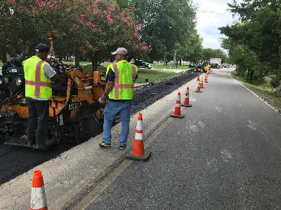 PMG Team working on an asphalt paving